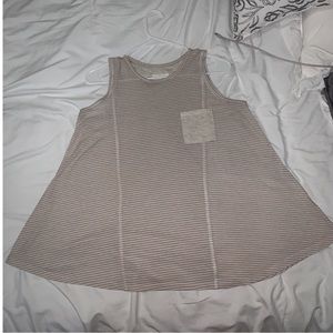 beige tank top, brand new condition
